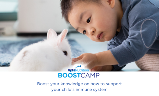 Resilience baby with pet rabbit Aptamil Boost camp