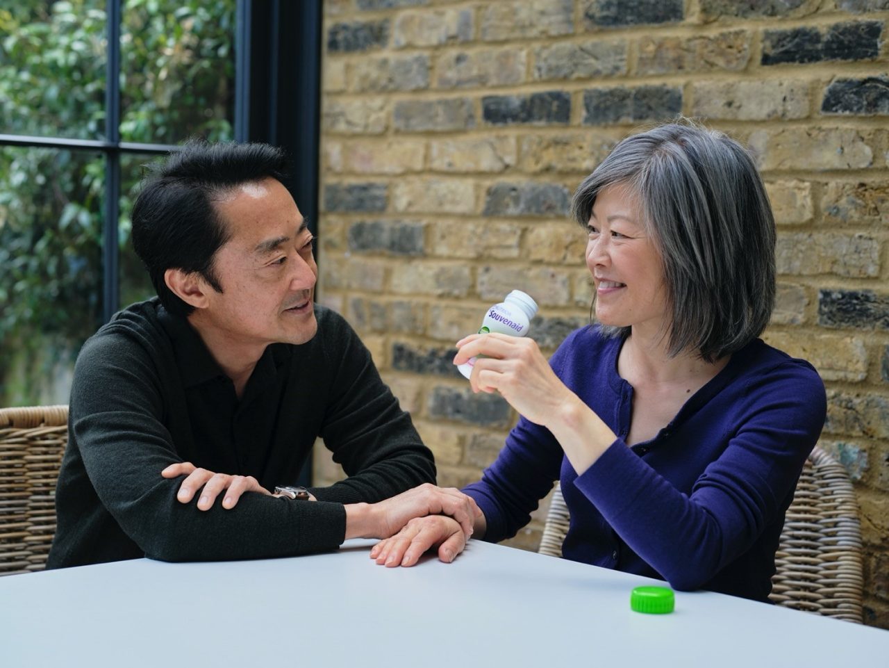 A woman drinking Souvenaid