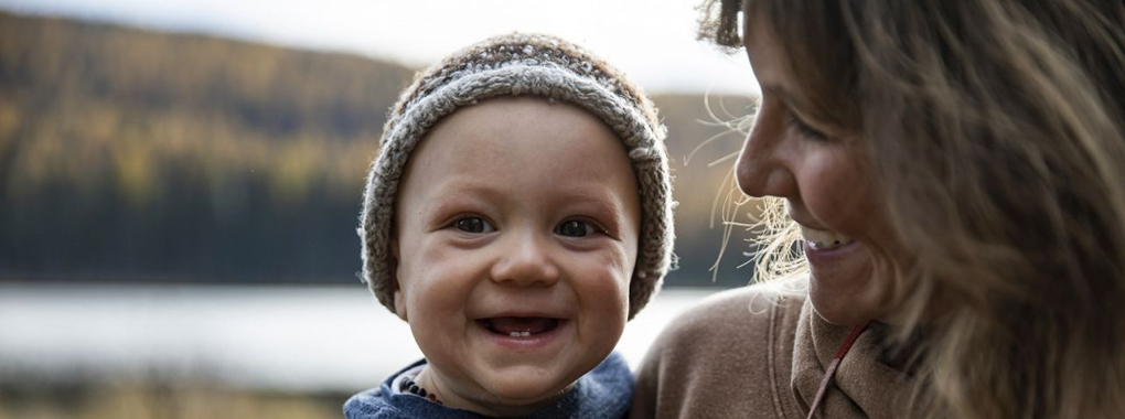 Baby smiling outside